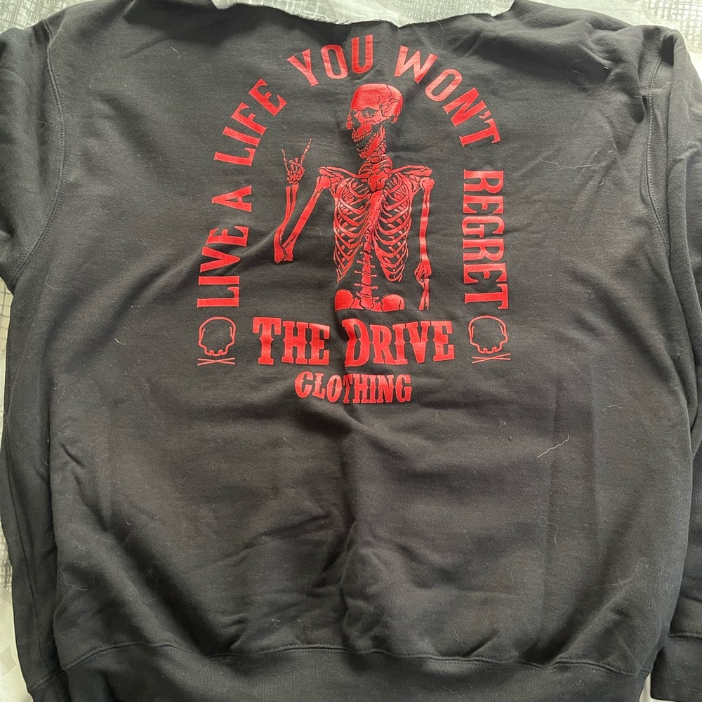 The drive clothing sweatshirt. Never worn.